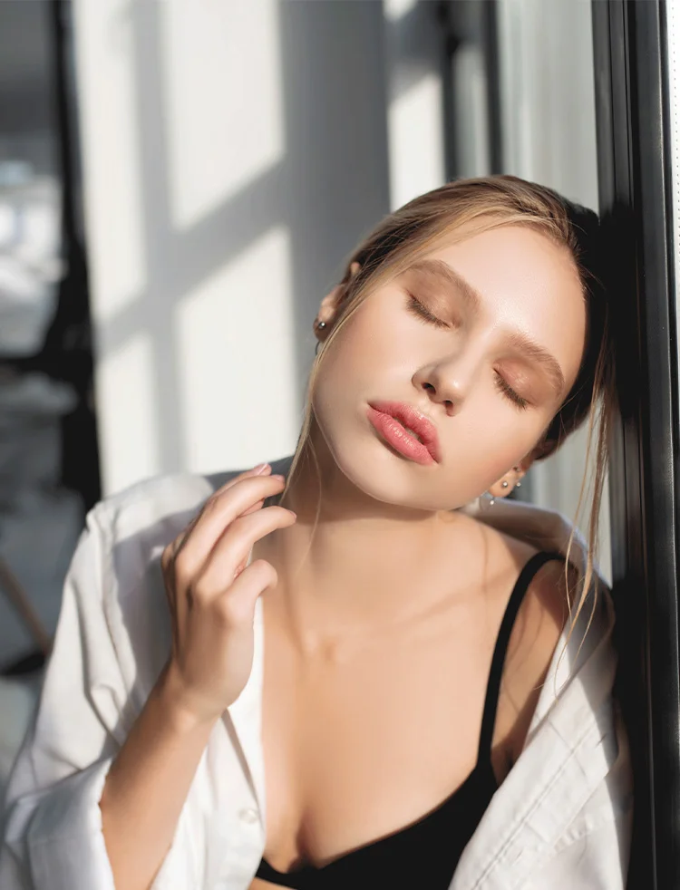 Woman staring into the sun with healthy skin | Geria Dermatology New Jersey