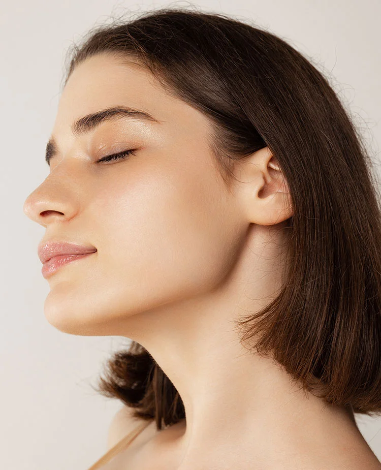 woman admiring her skin roascea | Geria Dermatology New Jersey